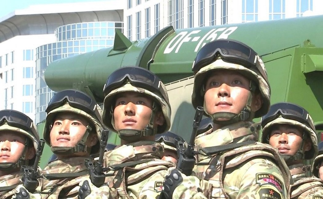 People's Liberation Army officers and the Dong-Feng (DF) 15B missile join the military parade in Beijing on September 3, 2015, to mark the 70th anniversary of the end of World War II. 