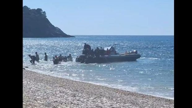 Turkish slave trafficking with high -speed migrants on a beach in Samos - video documentary