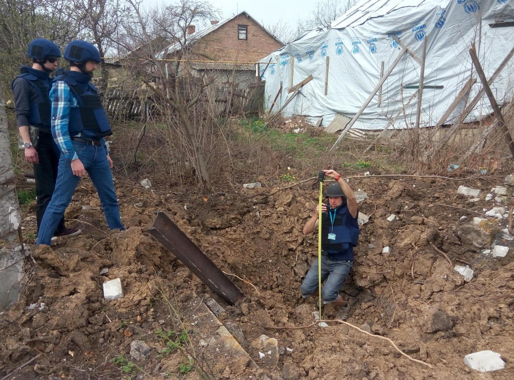 Norway support to Ukraine: Truth Hounds activists are working on the war crime site in Ukraine.