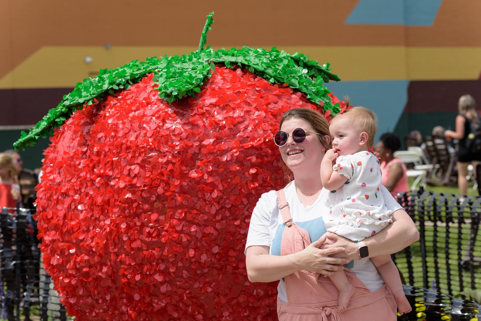 The 48th annual Troy Strawberry Festival took place on Saturday, June 1 and Sunday, June 2, 2024 in downtown Troy and the Great Miami River levee. Featured festivities included strawberry themed foods, vendors, live music and more. Here are scenes from Saturday plus a behind the scenes glimpse at the making of the festival’s famous strawberry donuts by Troy Music Boosters volunteers at Troy Memorial Stadium. This year’s festival theme was Blooming Berries. TOM GILLIAM / CONTRIBUTING PHOTOGRAPHER