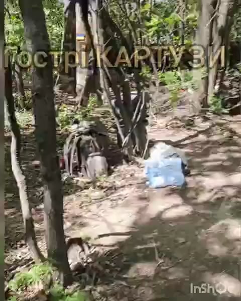 An Ukrainian soldier of the Peaky Blinders unit breaks cover to shoot down a fiber optic fpv