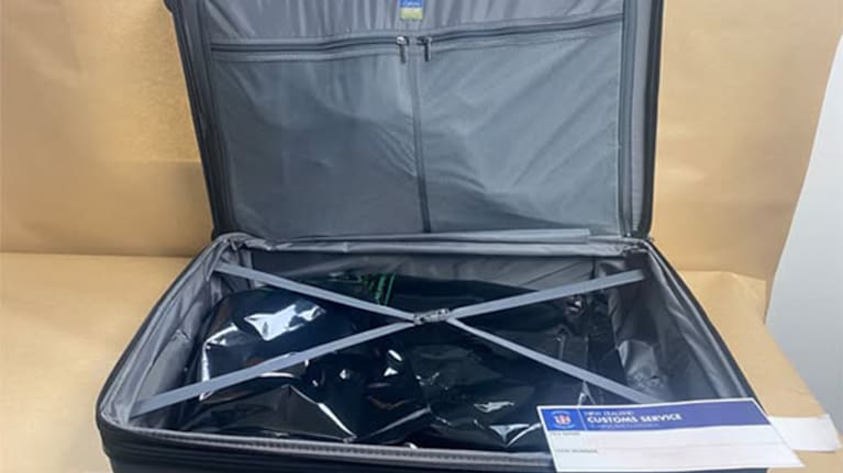 A teenager's suitcase, which was found to contain methamphetamine and cocaine. 