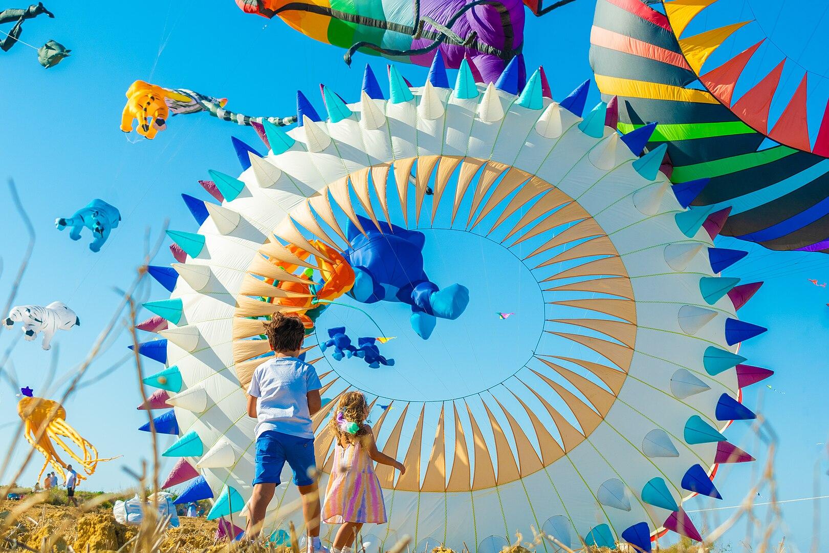 Slide right to see more photos. The International Wind and Kite Festival. Photo: Martina Vella CC by SA via Wikimedia Commons