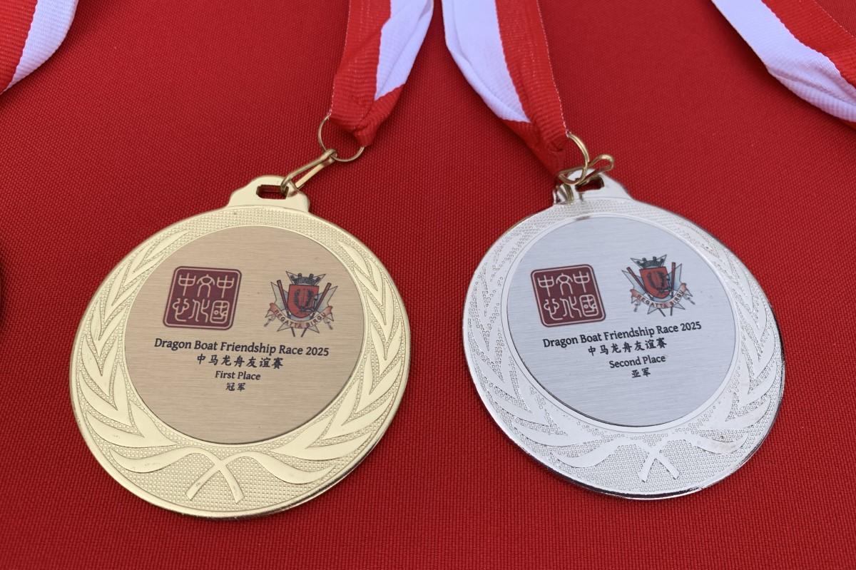 The winning team was awarded medals and a commemorative cup, while the second-placed team also received medals in recognition of their participation and effort.