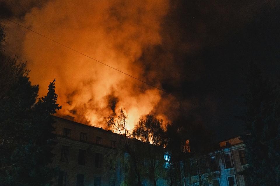 DNIPRO, UKRAINE - APRIL 16: A fire breaks out after the Russian drone attack in Dnipro, Ukraine on April 16, 2025. Russia attacked Dnipro with 'Shahed' UAV, which resulted in more than 10 explosions in city center. At least 2 people died and 3 others got injured. (Photo by Arsen Dzodzaiev/Anadolu via Getty Images)