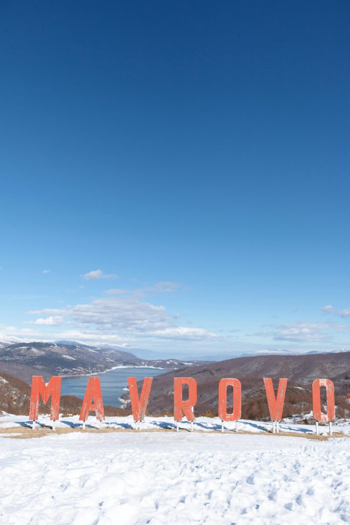 Mavrovo sign with view in Mavrovo National Park