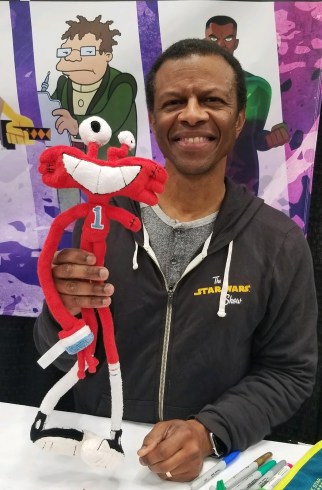 Phil LaMarr holds a toy version of his character Wilt from “Foster’s Home for Imaginary Friends.”