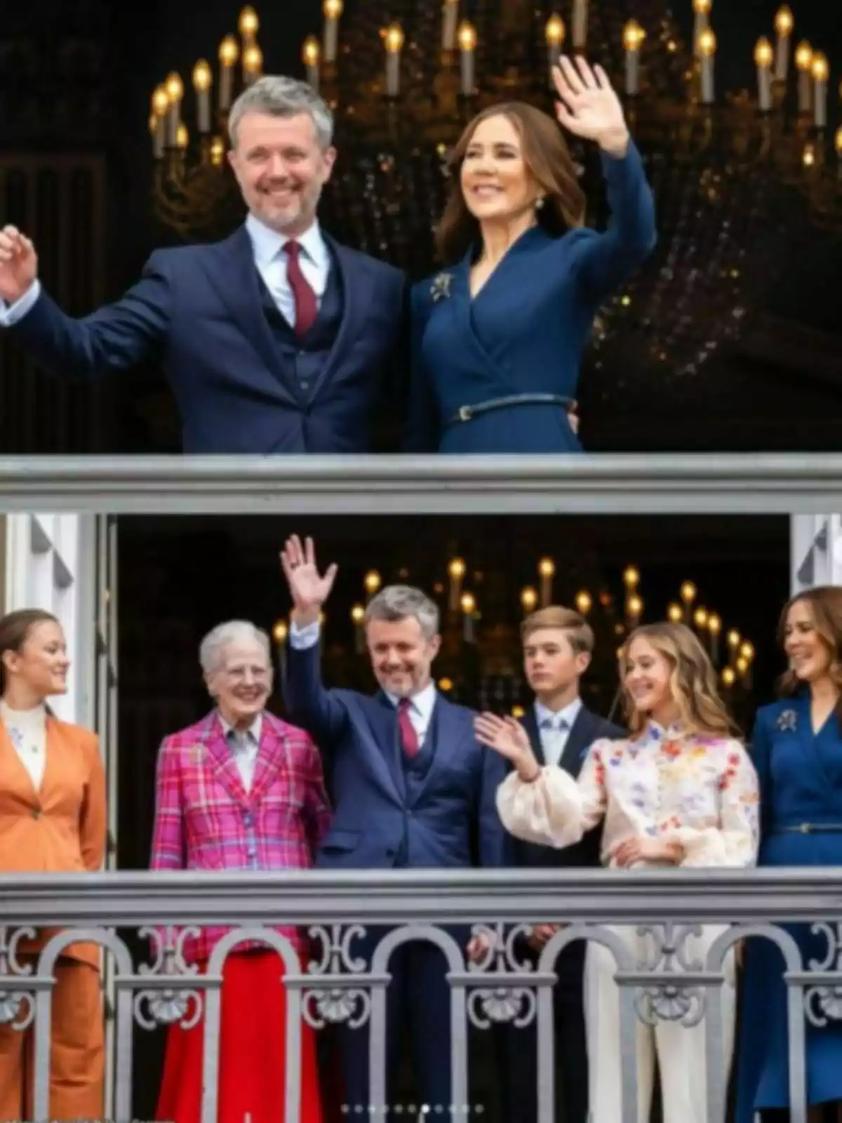 Several elegantly dressed people wave from a balcony decorated with a railing, with a lit chandelier in the background.
