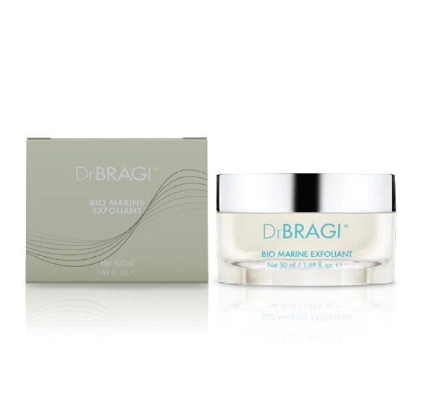 Dr. BRAGI Bio Marine Exfoliant jar and its light green box, both reflecting on a white surface.