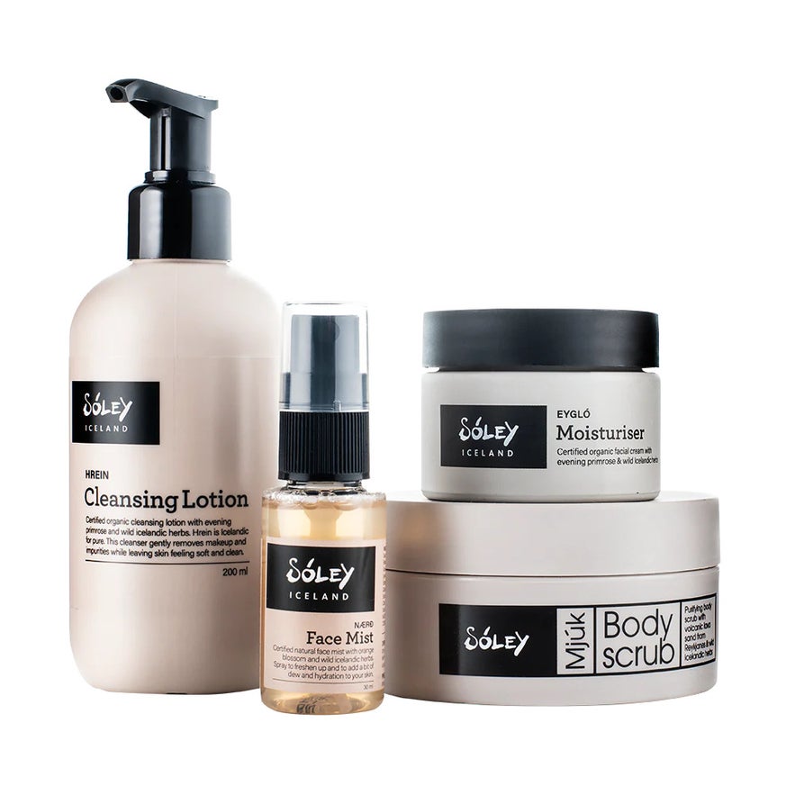 A collection of Sóley Organics Iceland skincare, including cleansing lotion, face mist, moisturizer, and body scrub.