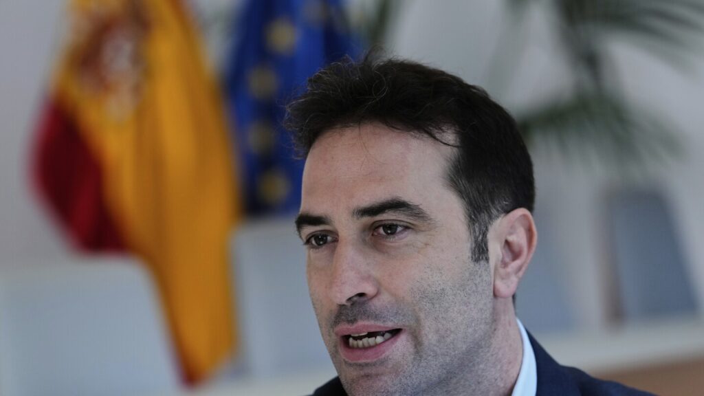 Spain's economy minister says the country's record tourist numbers present challenges