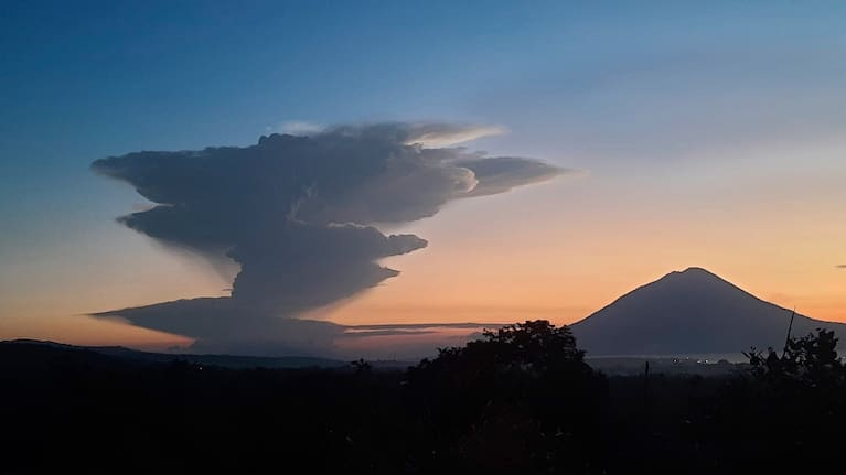 Volcanic smoke billows from Mount Lewotobi Laki-Laki during an eruption, as seen from Lembata, Indonesia.