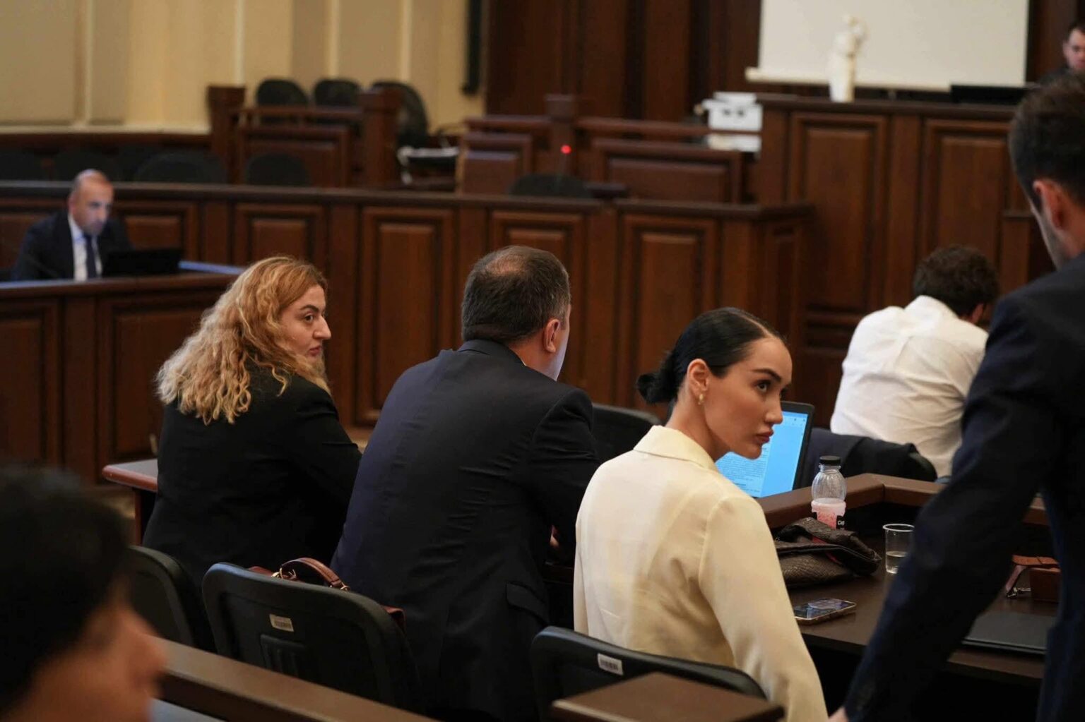 Judge forces unwanted public defenders to stay on political case, despite protests from both defendants and the lawyers themselves