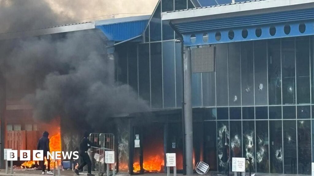 Larne: Leisure centre attacked in third night of violence in Northern Ireland