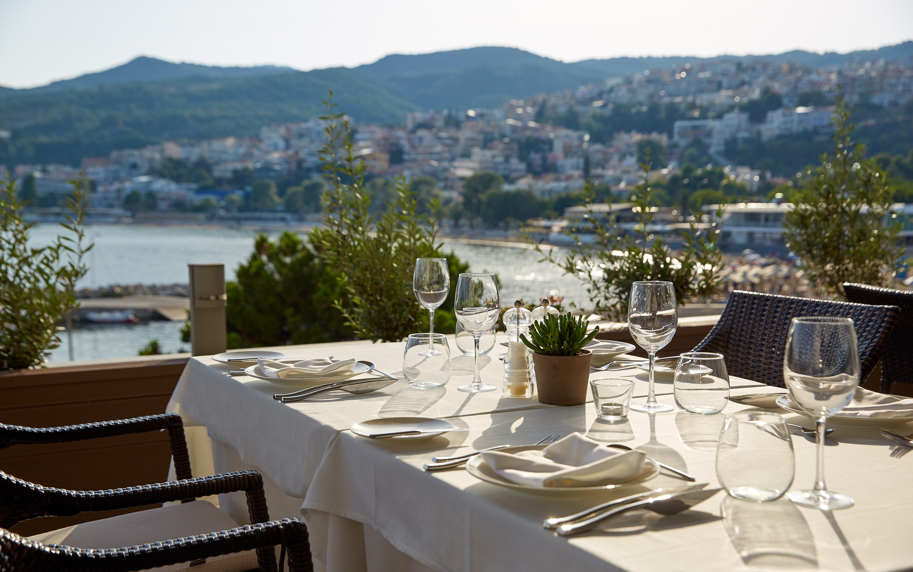 Table setting at Lucy Hotel with ocean and city view.