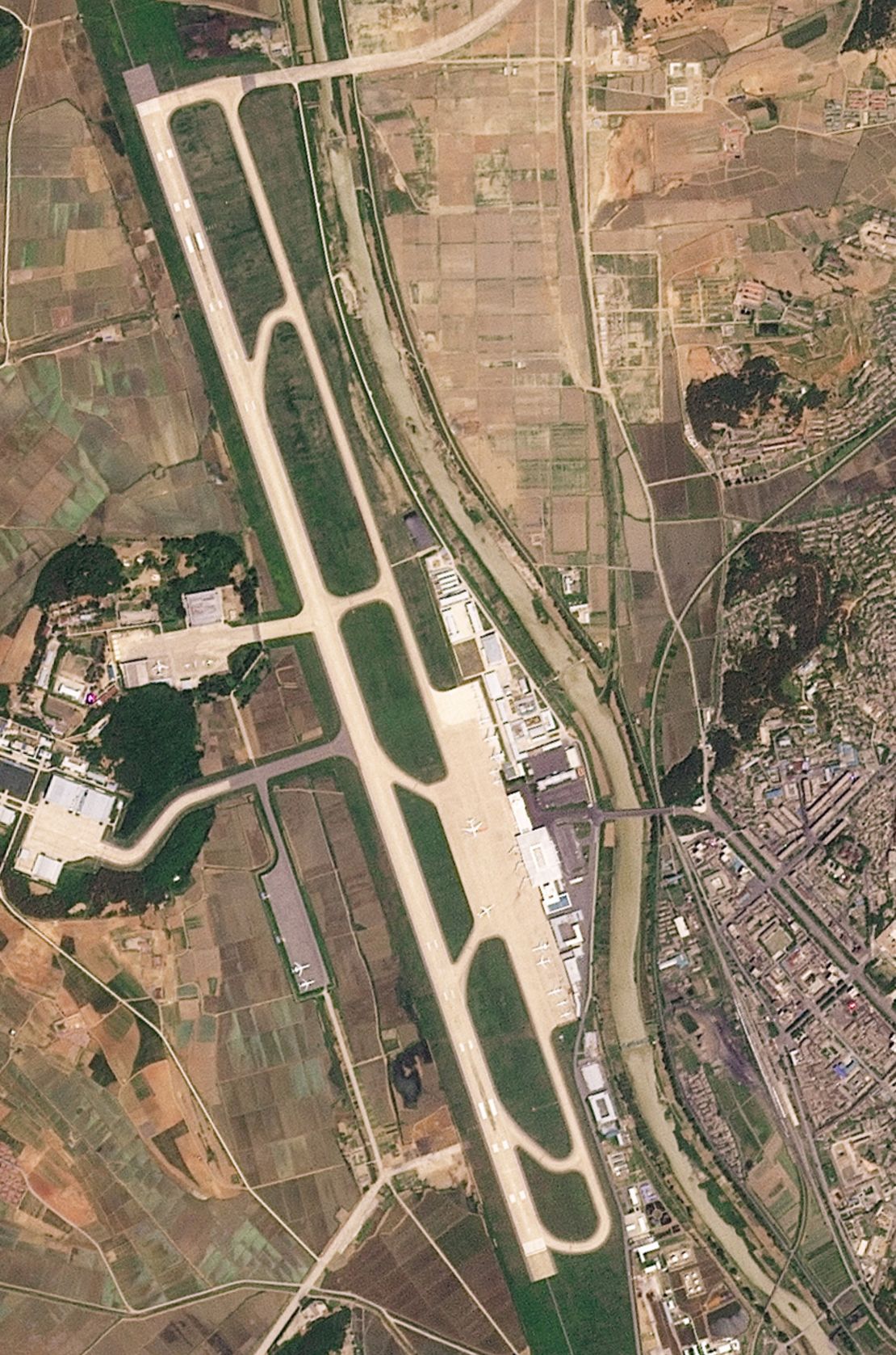 Satellite imagery of the Sunan airport in North Korea on June 4, 2025 shows what appear to be cargo planes on the tarmac.