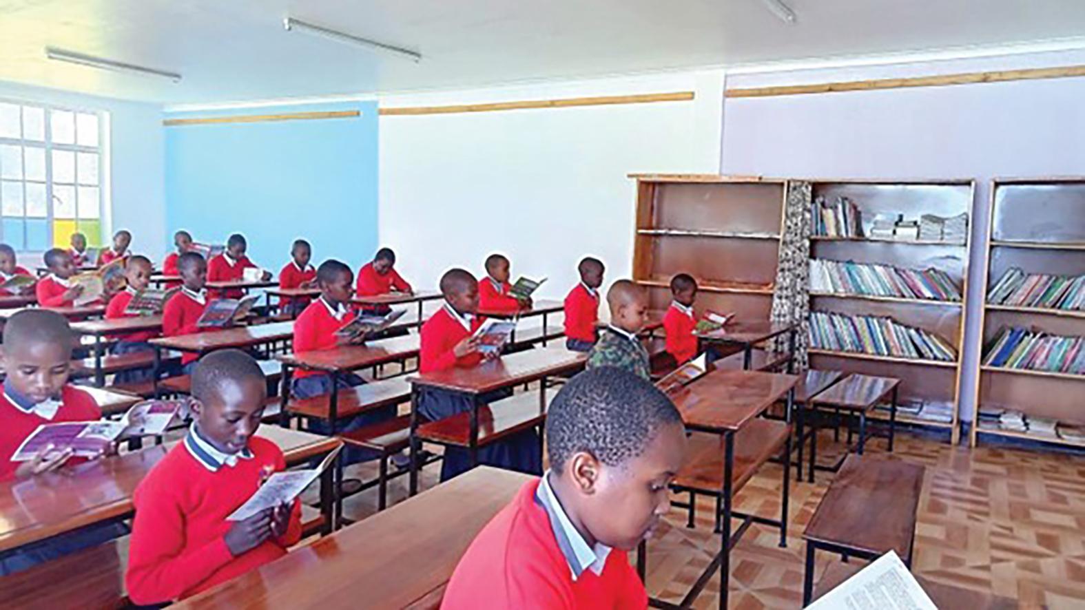 Students reading at the St Charles Borromeo School, in Mbeya, Tanzania.