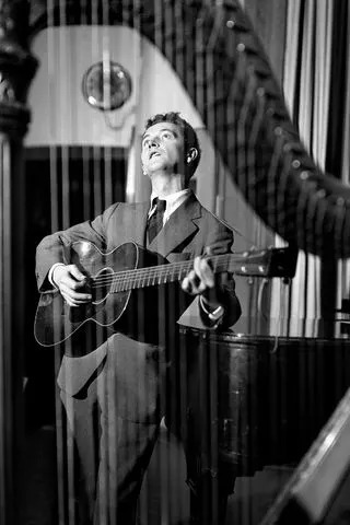 CBS via Getty Woody Guthrie in 1940