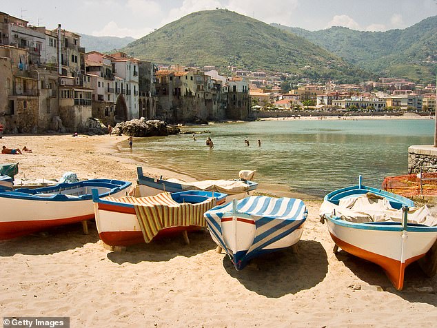 The small town of Cefalu in Sicily which is home to medieval bathhouses, a tangle of ancient lanes and a UNESCO-listed cathedral