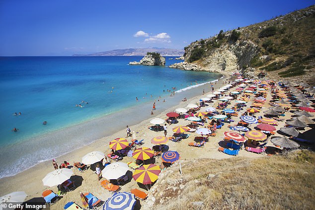 The small horseshoe beach at Pasqyra in Albania