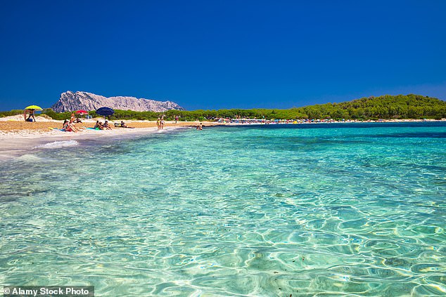 The shallow turquoise waters at Spiaggia di Lu Impostu in Sardinia