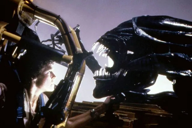 20th Century Fox Film Corp/Courtesy Everett Sigourney Weaver in a mech suit facing down the Alien Queen in 'Aliens'