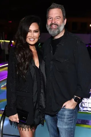 John Salangsang / Shutterstock for Entertainment Weekly Tia Carrere and Paul Debevec at the 2025 'Entertainment Weekly' Comic-Con bash in San Diego