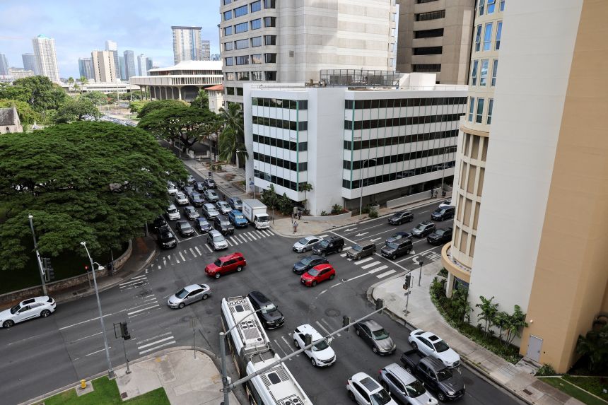 Traffic builds on S Beretania Street near downtown Honolulu after authorities warned residents of the possibility of destructive tsunami waves, in Honolulu, Hawaii, on Wednesday.