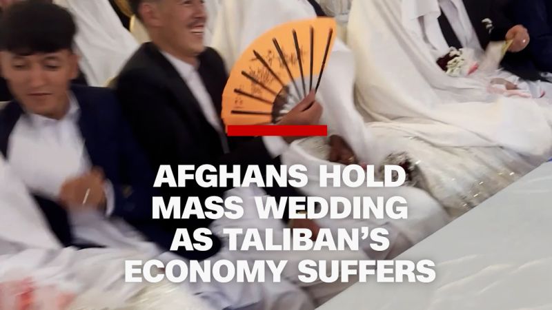 Afghans hold mass wedding as Taliban’s economy suffers