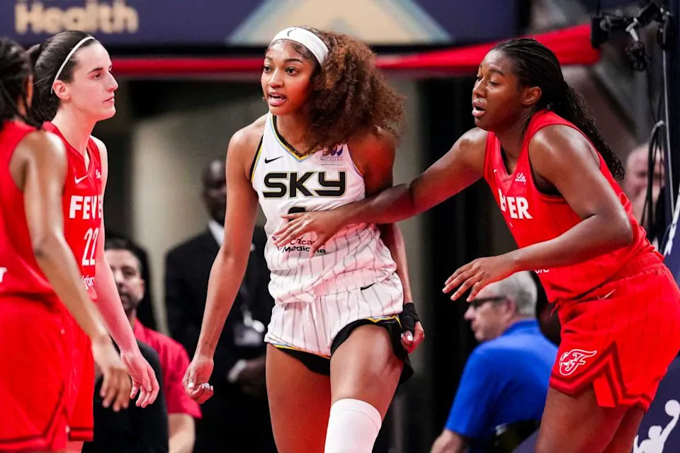 Chicago Sky forward Angel Reese (5) reacts to a flagrant foul from Indiana Fever guard Caitlin Clark (22).© Grace Smith&sol;IndyStar &sol; USA TODAY NETWORK via Imagn Images