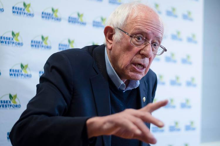 U.S. Sen. Bernie Sanders, I-Vermont, speaks with members of the media after a town meeting with students at Essex High School in Essex Junction on Thursday, January 12, 2023.  (VtDigger - Glenn Russell)