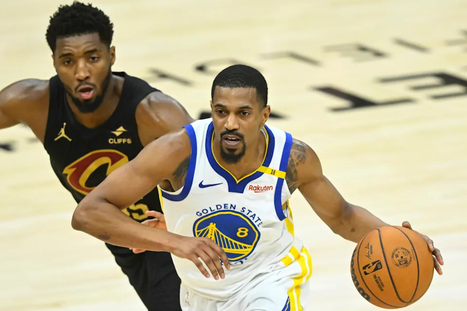 Nov 8, 2024; Cleveland, Ohio, USA; Golden State Warriors guard De'Anthony Melton (8) drives beside Cleveland Cavaliers guard Donovan Mitchell (45) in the fourth quarter at Rocket Mortgage FieldHouse. Mandatory Credit: David Richard-Imagn Images© David Richard-Imagn Images