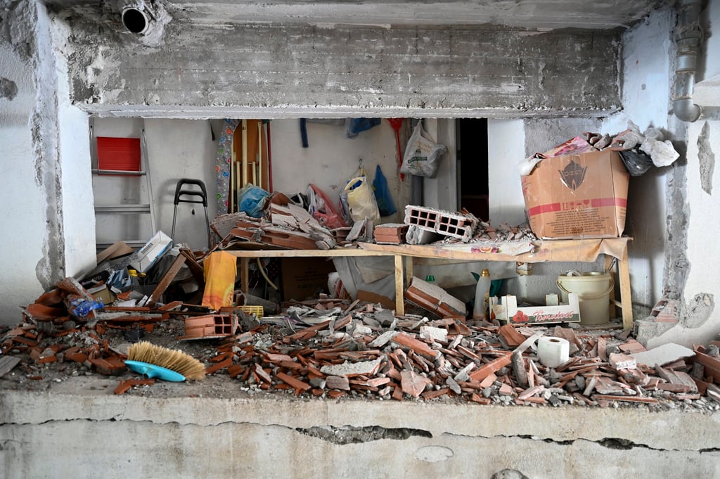 A view of the site where a bomb exploded. Photo: AP A view of the site where a bomb exploded. Photo: AP