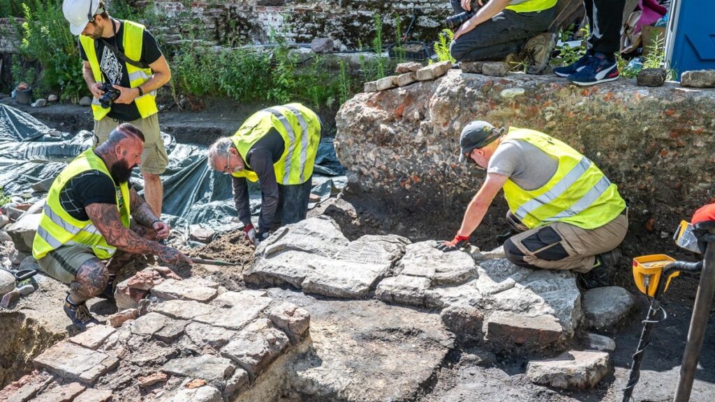 Archeologists discover remains of medieval knight under Polish shop