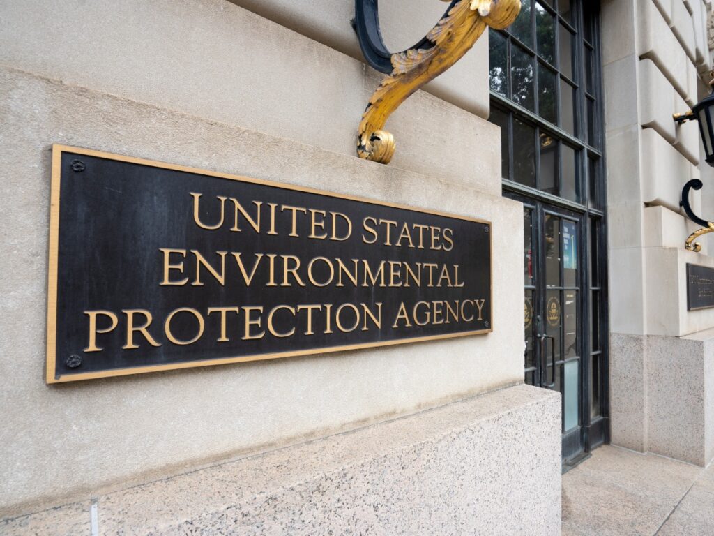A black plaque with 'United States Environmental Protection Agency' written in gold font, in full caps.