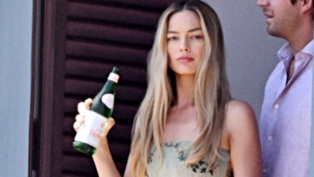 Margot Robbie Wears the Miniest Mini Dress—Because When in Italy