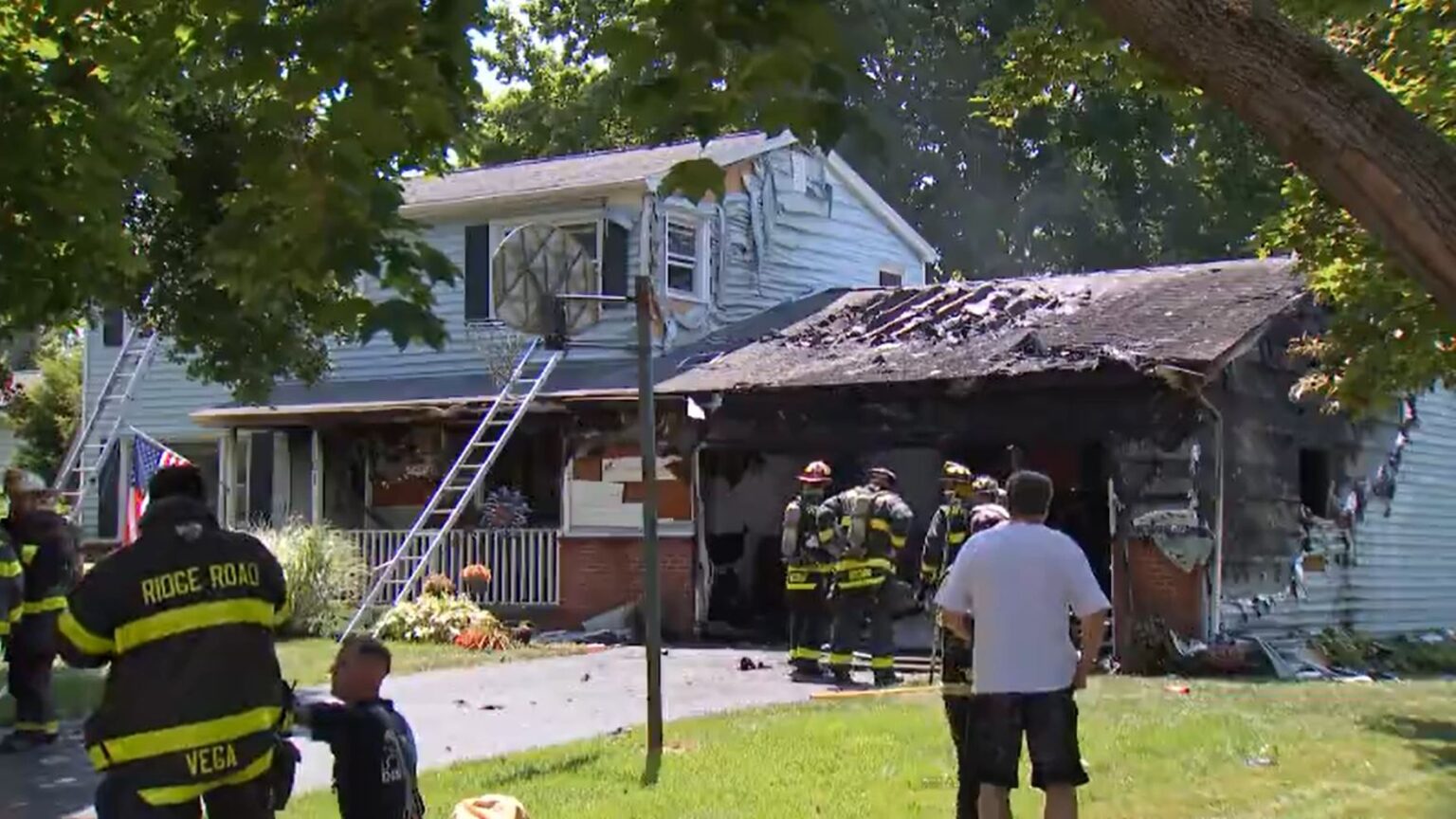 Crews battle garage fire in Greece, stopping it from spreading to home Crews battle garage fire in Greece, stopping it from spreading to home
