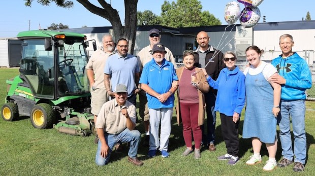 Former Fullerton School District Superintendent Duncan Johnson stands with his...