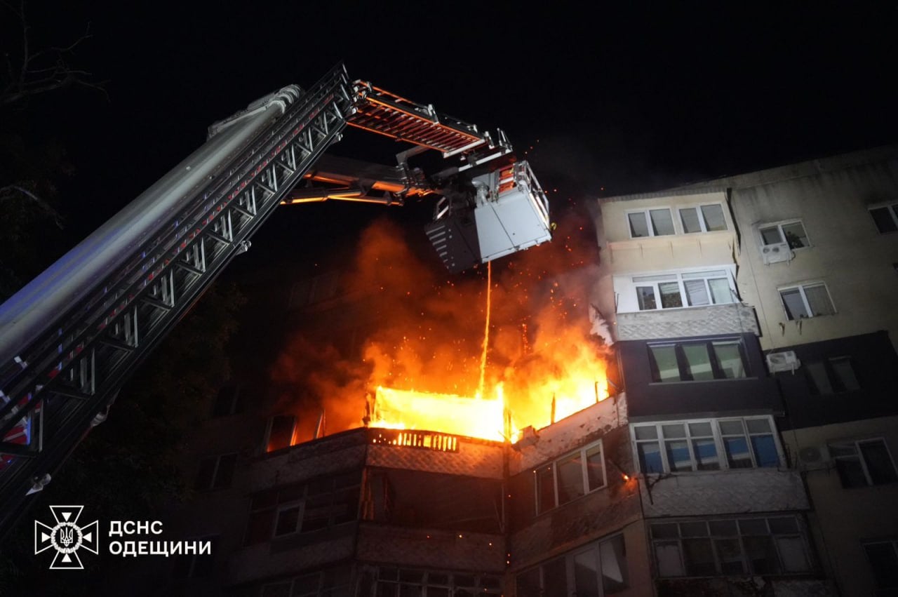 Photos shared by Ukraine’s emergency services shows rescuers carrying children in the dark out of a multi-storey apartment building on fire and firefighters fighting the blaze