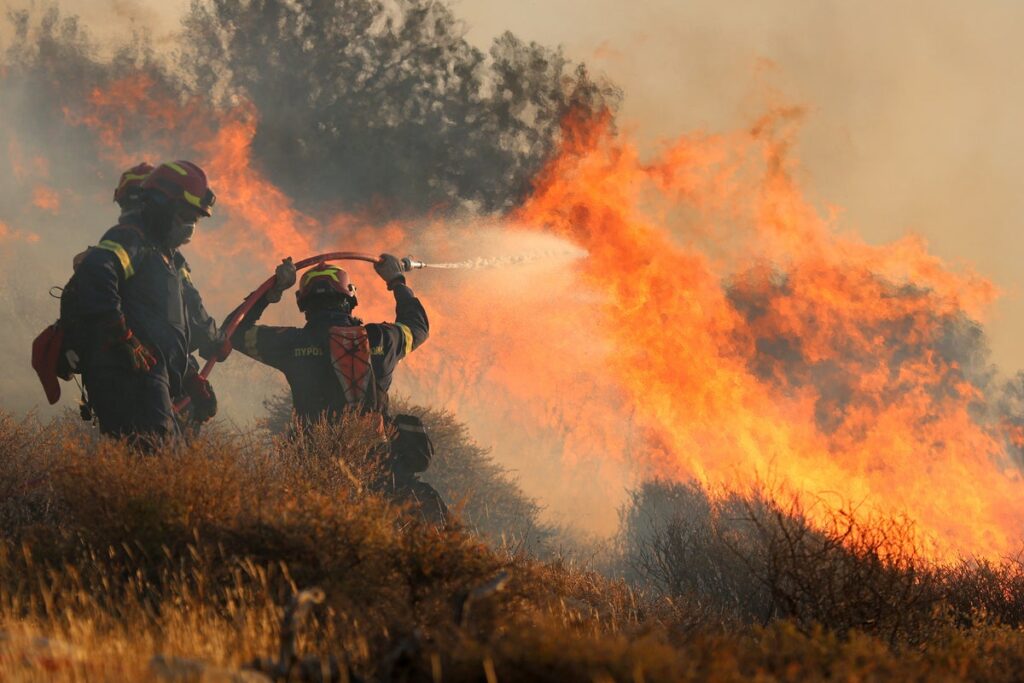 At least 1,500 evacuated as massive wildfire rips through Greek holiday island