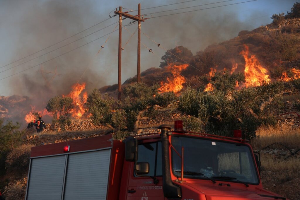 Thousands of tourists and homeowners forced to evacuate after wildfire rips through Crete Thousands of tourists and homeowners forced to evacuate after wildfire rips through Crete