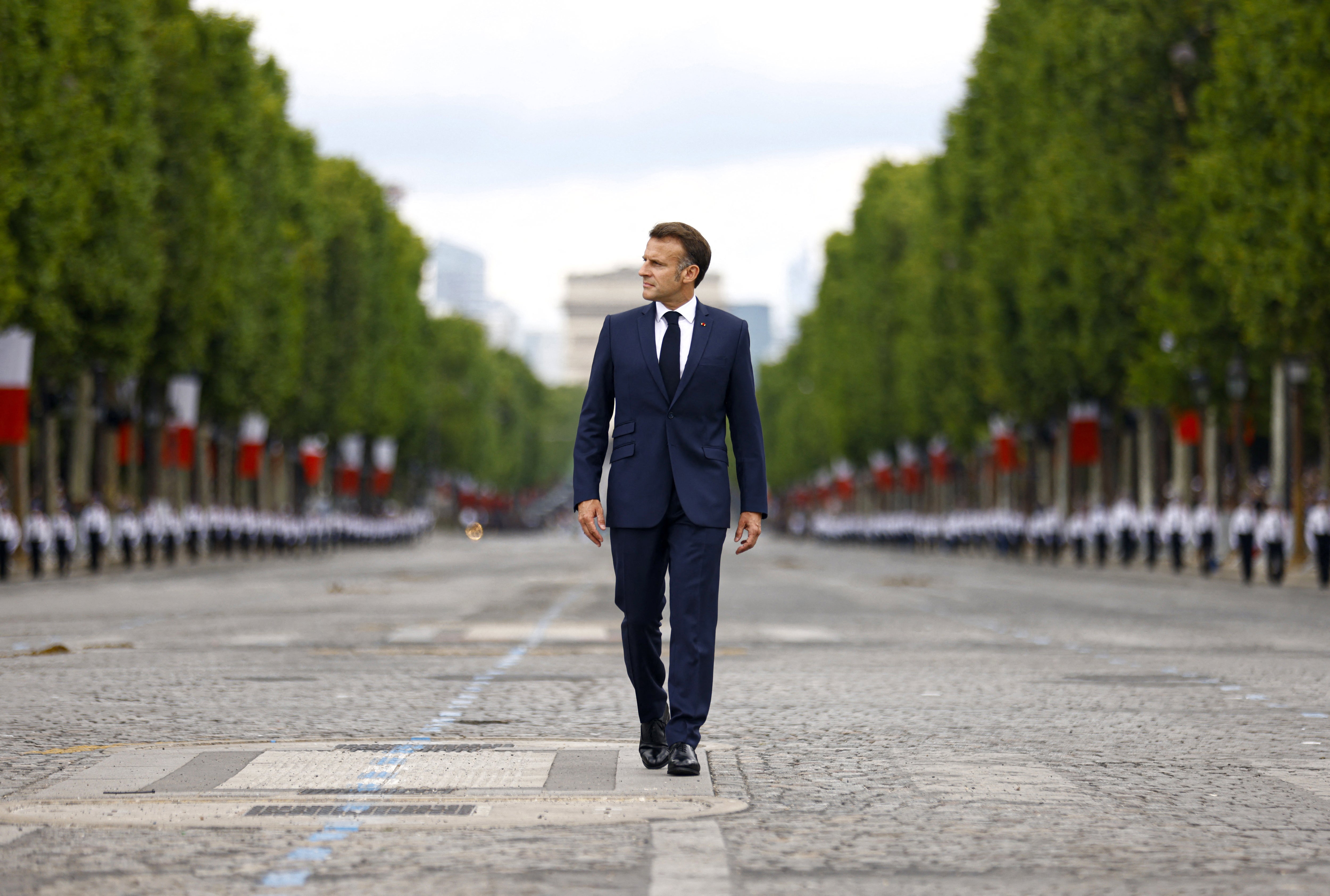 Emmanuel Macron arrives at the Bastille Day military parade in Paris on Monday