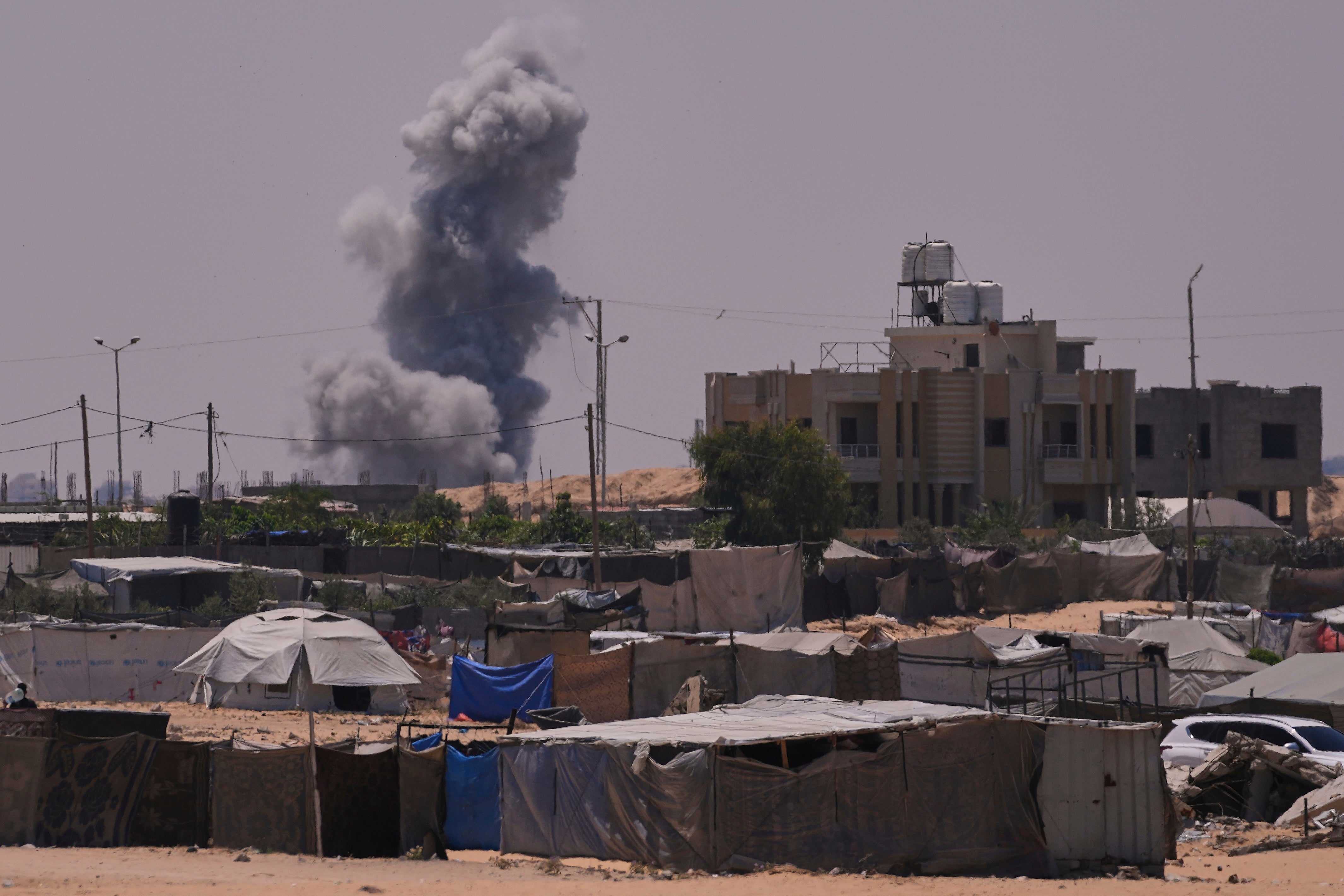 Smoke rises to the sky following an Israeli army airstrike in Khan Younis on Saturday