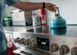 FILE - An induction range at a home in Portland, Ore., on Dec. 1, 2022, which is powered by an electromagnetic field under the surface of the glass cooktop.