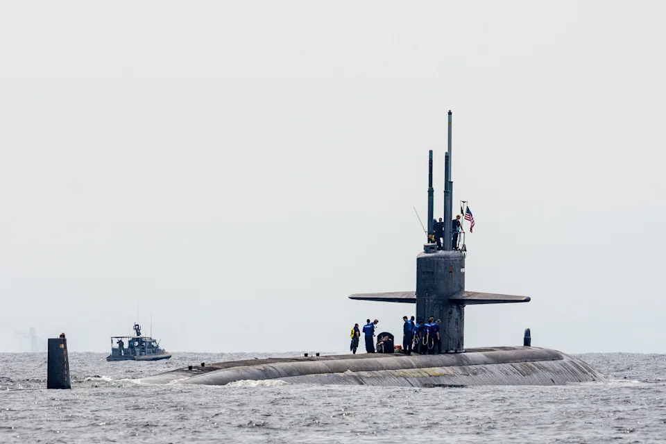 People standing on the submarine USS Newport News