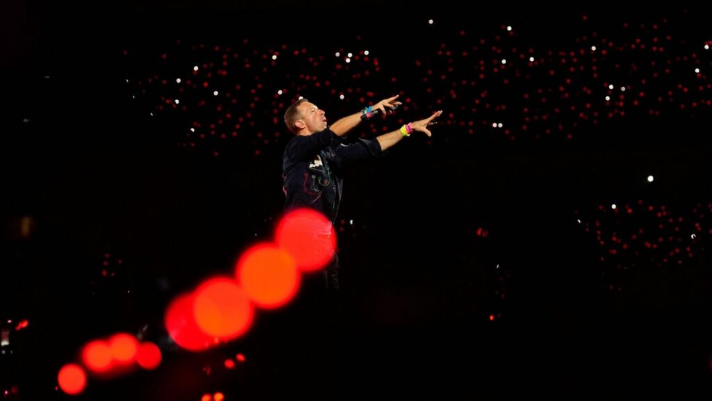 Chris Martin of Coldplay performs during the band's Music Of The Spheres World Tour at D.Y. Patil Sports Stadium in Navi Mumbai, Saturday, Jan. 18, 2025. (AP Photo/Rajanish Kakade, File)