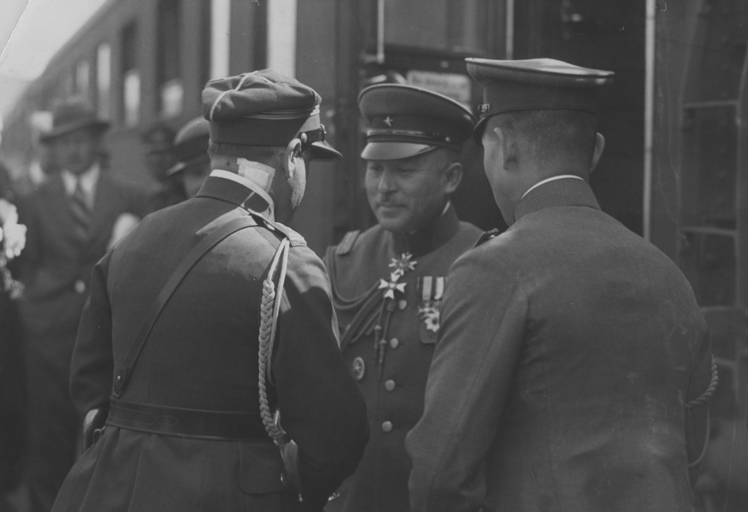 Col. Masataka Yamawaki, a military attache to Poland being warmly welcomed by Polish officers at the train station in Warsaw, 1934. Notice the Polish medals he is wearing.