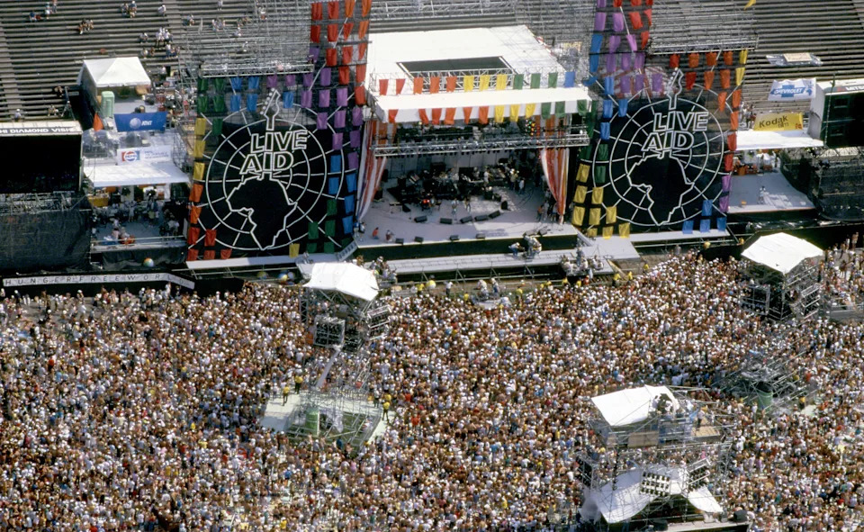 Aerial view of the more than 90,000 music lovers jamming the JFK Stadium in Philadelphia for the Live Aid Concert to hear rock stars sing out against world hunger on July 13, 1985. On stage, Crosby, Stills and Nash is performing. M