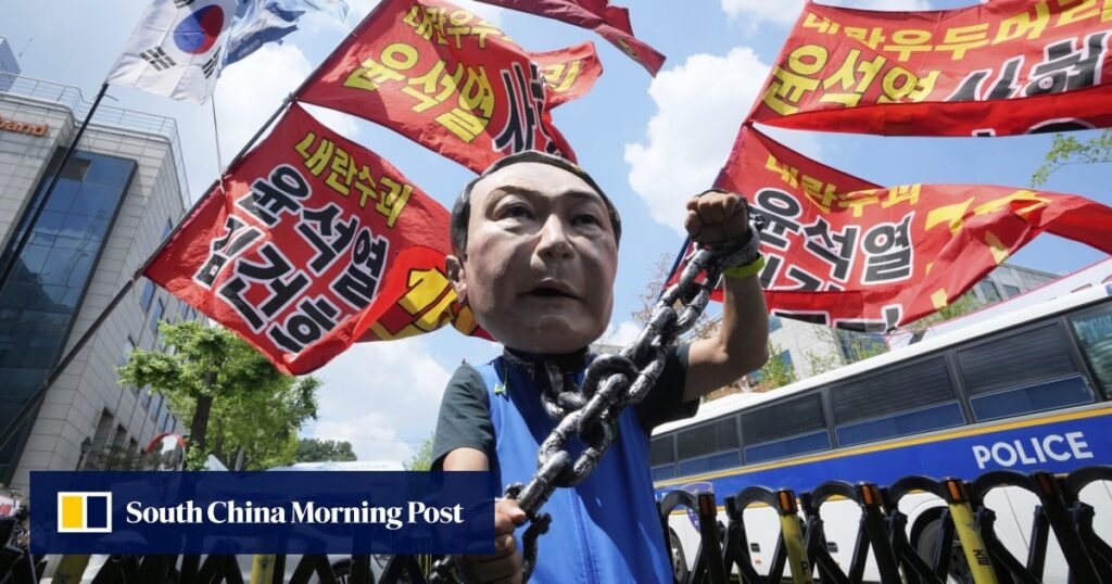 South Korea’s Yoon Suk-yeol back behind bars over martial law decree