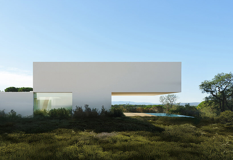 fran silvestre arquitectos stretches all-white linear residence across narrow site in spain